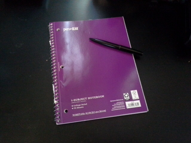 notebook with pen